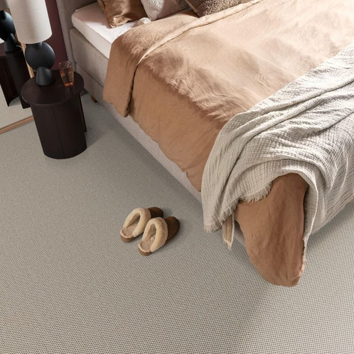 Welk vloerkleed past bij een lichte houten vloer in 2026?